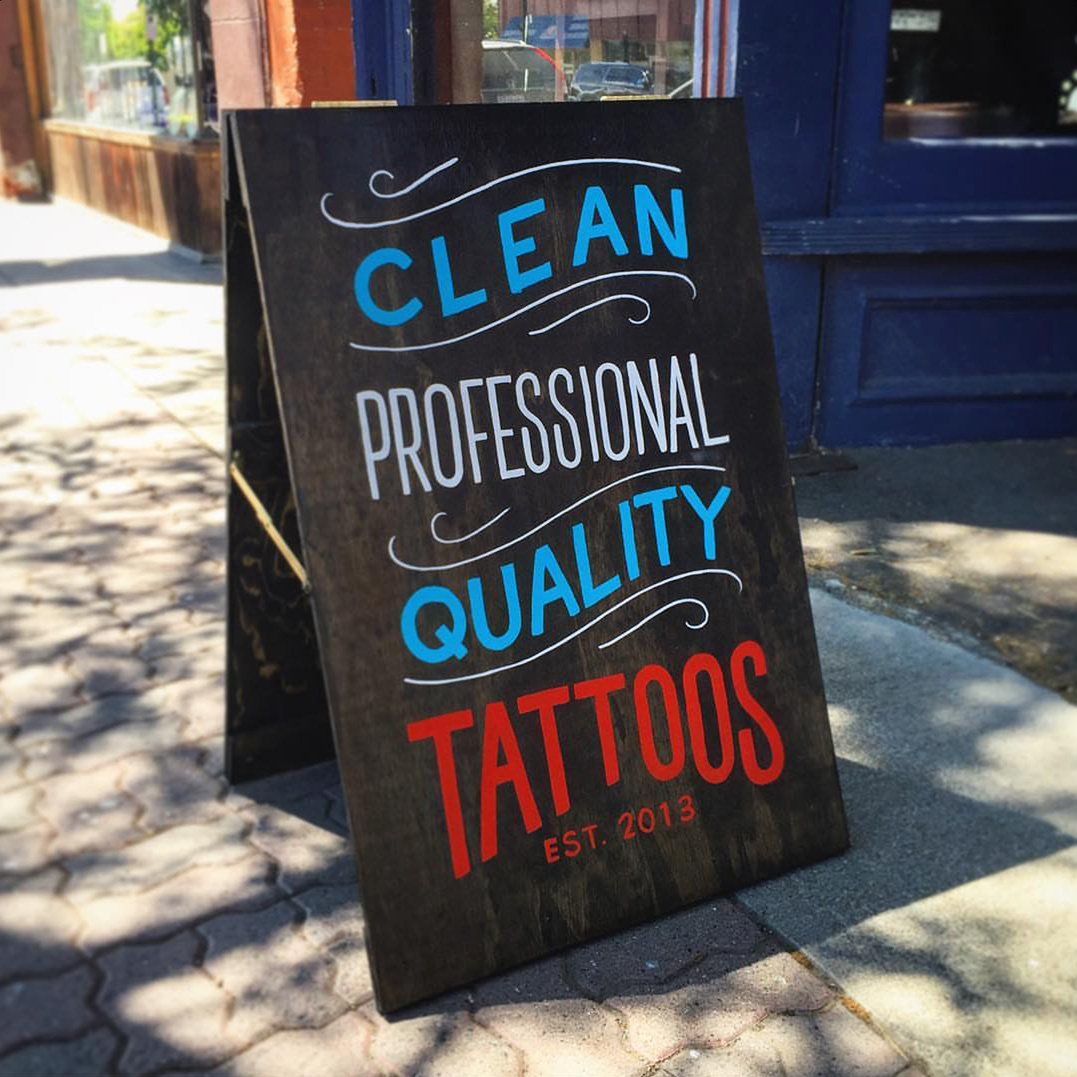 LaurelFisher_SignPainting_TattooShop_Tacoma_Artist